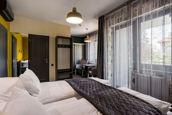 Imagen de la habitación del Hotel Ikonik Spa Panzi&oacute;. Foto 19