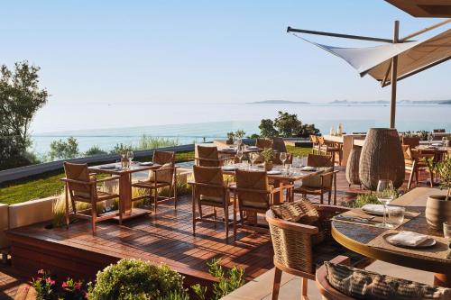 Imagen del bar/restaurante del Hotel Ikos Odisia - All Inclusive. Foto 2