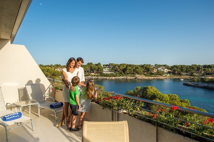 Imagen de la habitación del Hotel Ikos Porto Petro. Foto 6