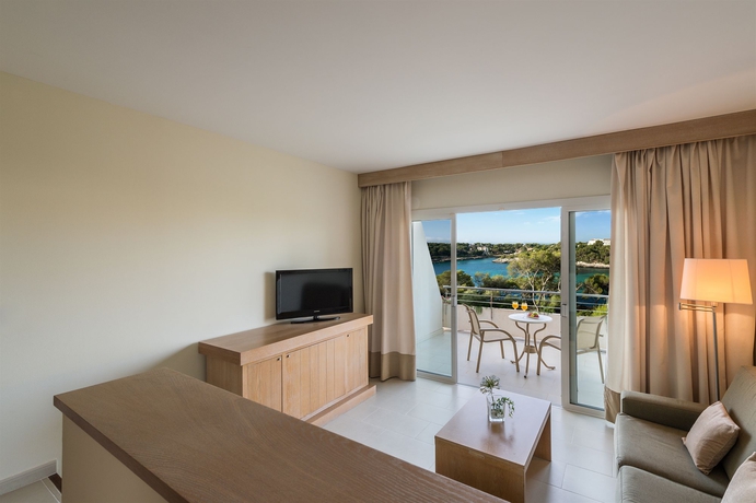 Imagen de la habitación del Hotel Ikos Porto Petro. Foto 7