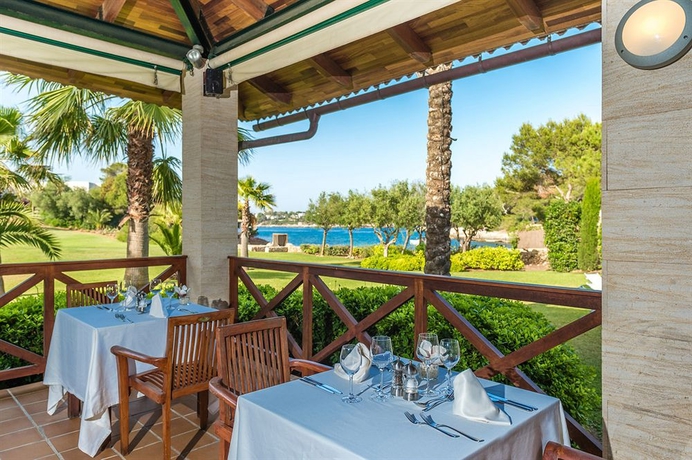 Imagen del bar/restaurante del Hotel Ikos Porto Petro. Foto 5