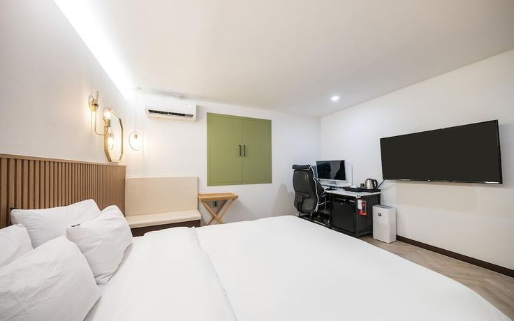 Imagen de la habitación del Hotel Iksan 174. Foto 2