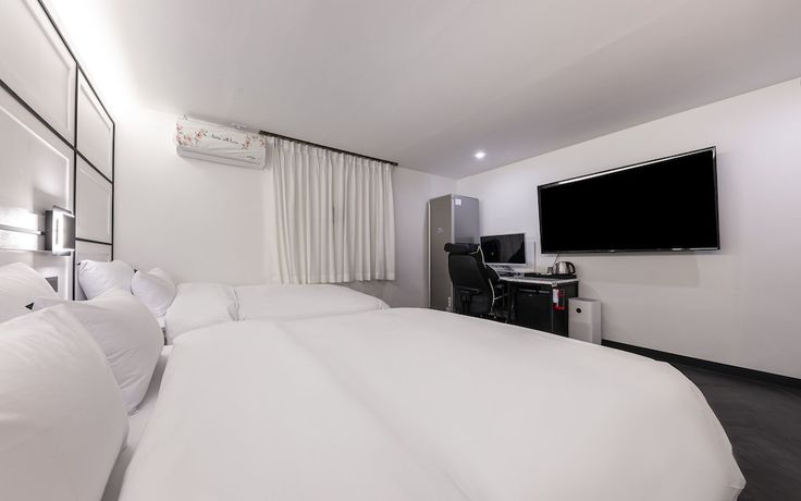 Imagen de la habitación del Hotel Iksan 174. Foto 14