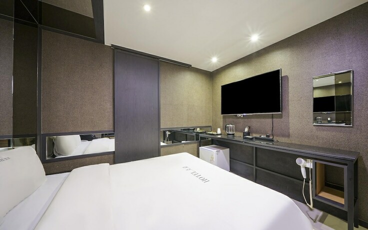 Imagen de la habitación del Hotel Iksan Choco. Foto 17