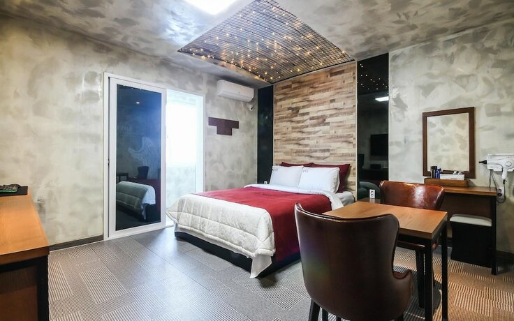 Imagen de la habitación del Hotel Iksan Rings. Foto 23