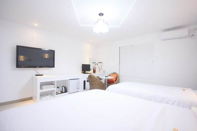 Imagen de la habitación del Hotel Iksan Vitamin. Foto 12