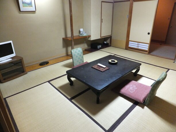 Imagen de la habitación del Hotel Ikuji Onsen Tanakaya. Foto 22