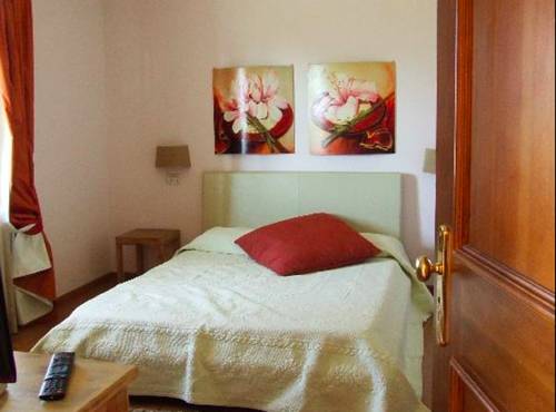 Imagen de la habitación del Hotel Il Baio Relais & Natural Spa. Foto 6