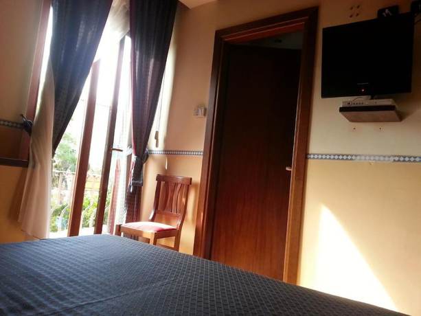 Imagen de la habitación del Hotel Il Barocco. Foto 11