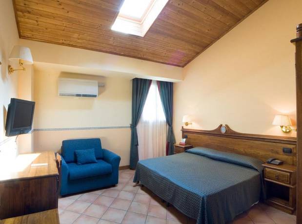 Imagen de la habitación del Hotel Il Barocco. Foto 16
