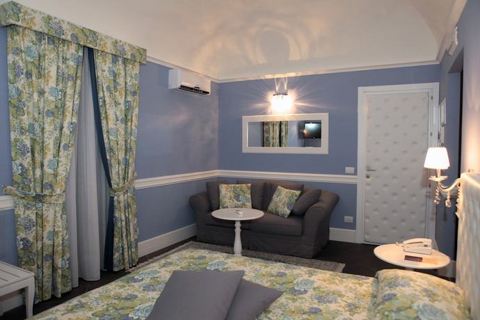 Imagen de la habitación del Hotel Il Barocco. Foto 17