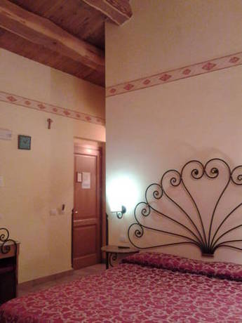 Imagen de la habitación del Hotel Il Borgo Dell'ulivo. Foto 3
