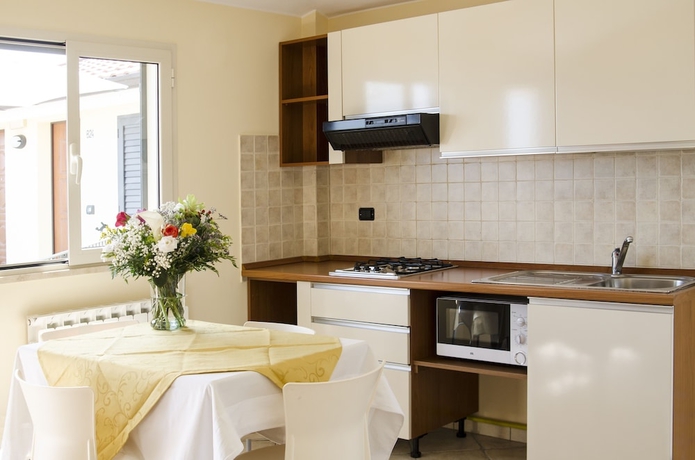 Imagen de la habitación del Hotel Il Borgo Residence. Foto 10
