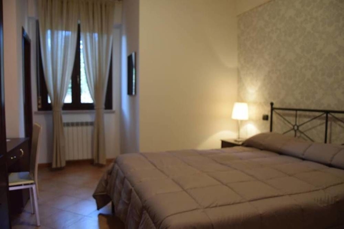 Imagen de la habitación del Hotel Il Boschetto, Tolentino. Foto 5