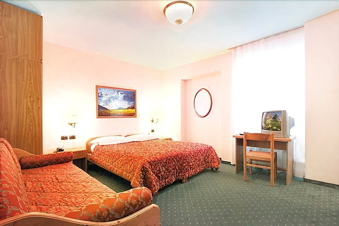 Imagen de la habitación del Hotel Il Caminetto, Canazei. Foto 3