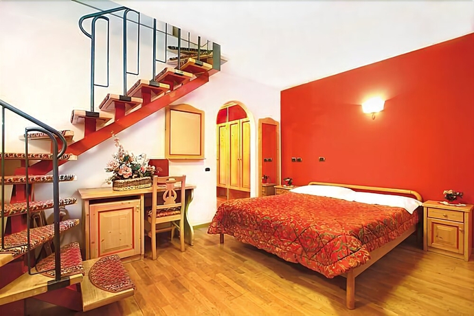 Imagen de la habitación del Hotel Il Caminetto, Canazei. Foto 5