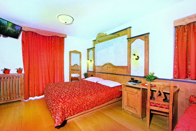 Imagen de la habitación del Hotel Il Caminetto, Canazei. Foto 6
