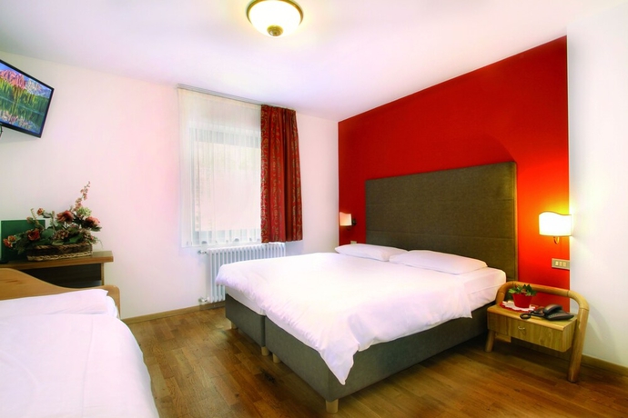 Imagen de la habitación del Hotel Il Caminetto, Canazei. Foto 7