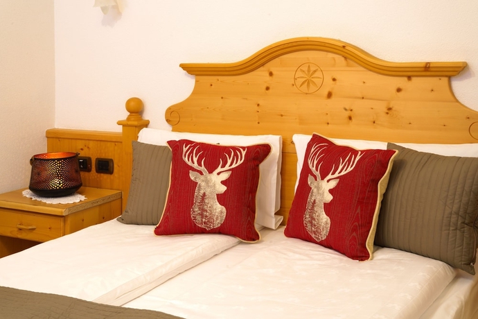 Imagen de la habitación del Hotel Il Caminetto, Canazei. Foto 9