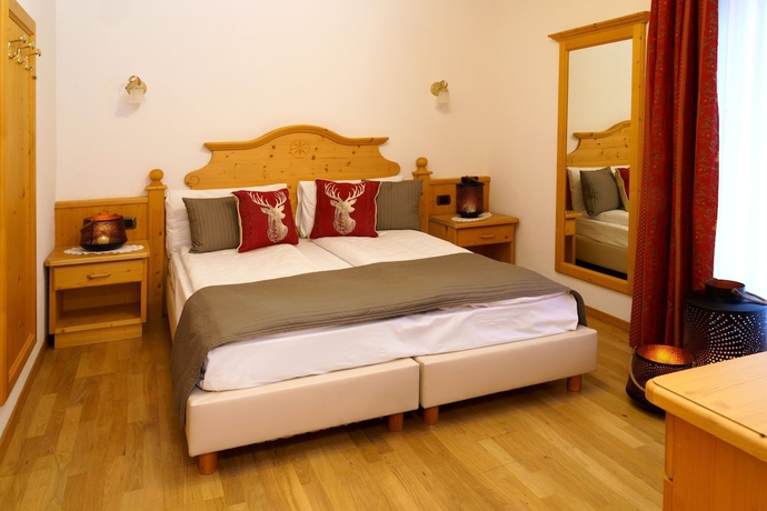 Imagen de la habitación del Hotel Il Caminetto, Canazei. Foto 10