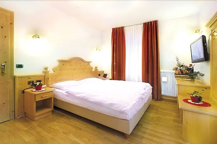 Imagen de la habitación del Hotel Il Caminetto, Canazei. Foto 13