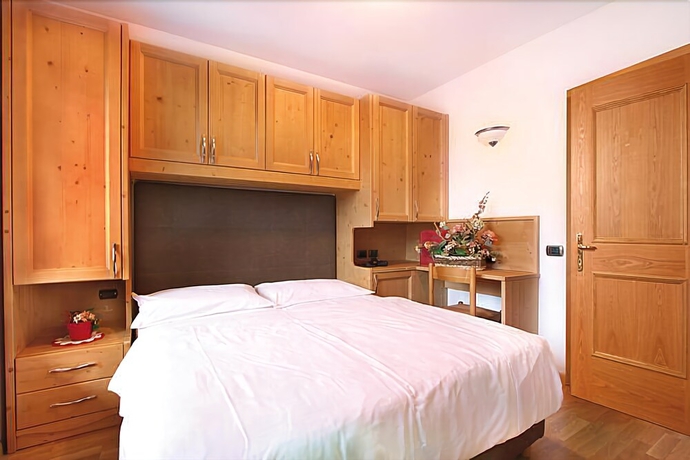 Imagen de la habitación del Hotel Il Caminetto, Canazei. Foto 14