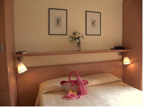 Imagen de la habitación del Hotel Il Caminetto. Foto 14