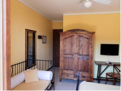 Imagen de la habitación del Hotel Il Caminetto. Foto 15