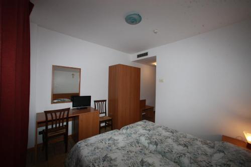Imagen de la habitación del Hotel Il Canneto. Foto 10