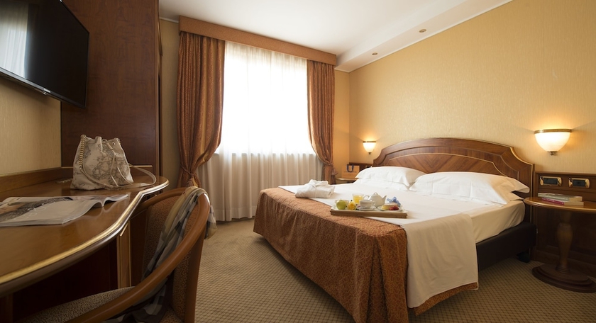 Imagen de la habitación del Hotel Il Castelletto. Foto 11