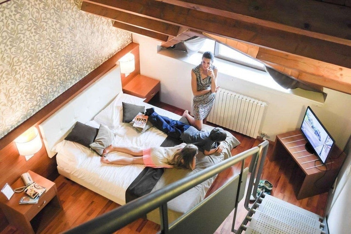 Imagen de la habitación del Hotel Il Cervo. Foto 10