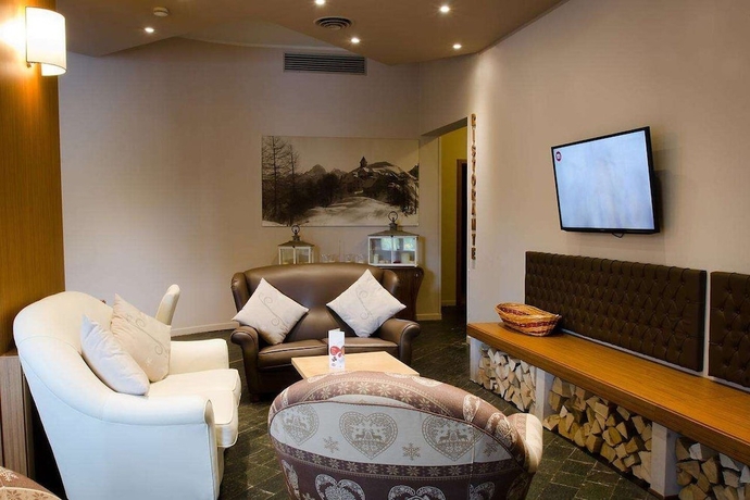 Imagen de la habitación del Hotel Il Cervo. Foto 12