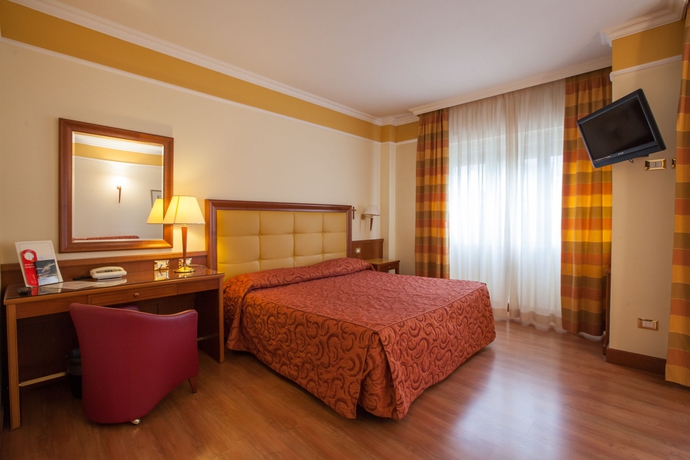 Imagen de la habitación del Hotel Il Chiostro. Foto 10