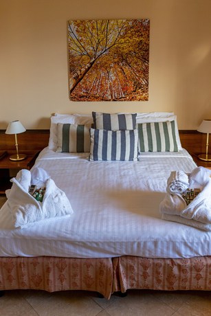 Imagen de la habitación del Hotel Il Ciocco Hotels. Foto 8