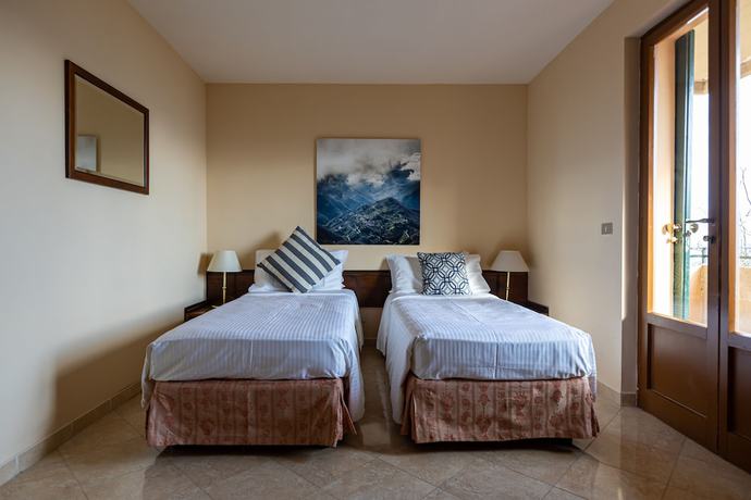 Imagen de la habitación del Hotel Il Ciocco Hotels. Foto 9