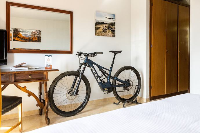 Imagen de la habitación del Hotel Il Ciocco Hotels. Foto 10