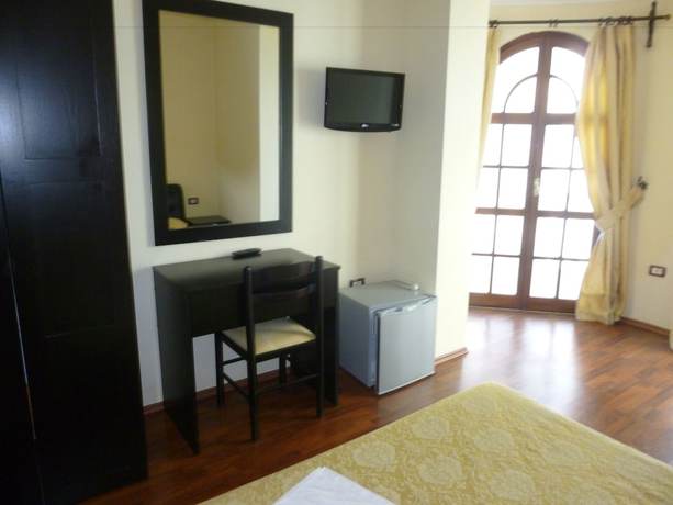 Imagen de la habitación del Hotel Il Conte Di Monte Cristo. Foto 11