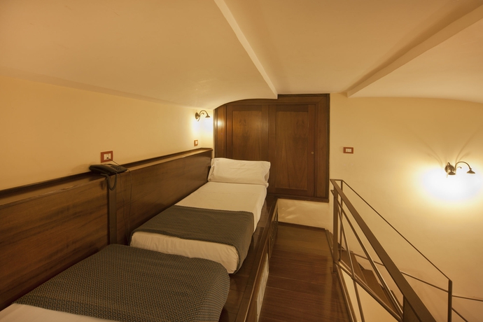 Imagen de la habitación del Hotel Il Convento. Foto 2