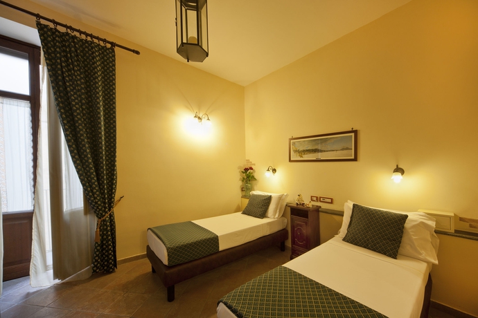 Imagen de la habitación del Hotel Il Convento. Foto 8