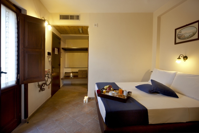 Imagen de la habitación del Hotel Il Convento. Foto 10