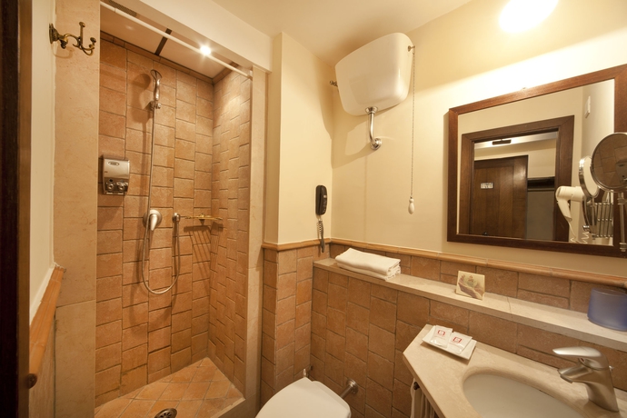 Imagen de la habitación del Hotel Il Convento. Foto 12