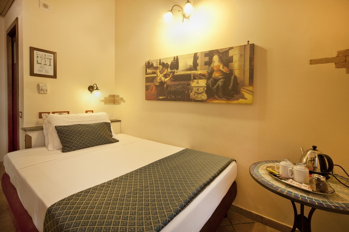 Imagen de la habitación del Hotel Il Convento. Foto 13