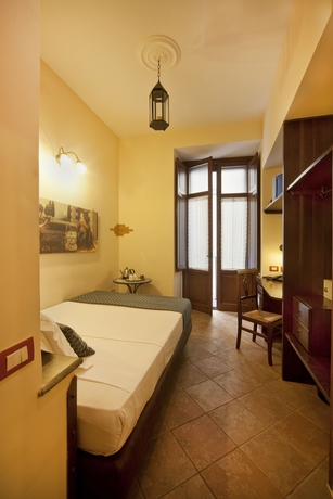 Imagen de la habitación del Hotel Il Convento. Foto 15