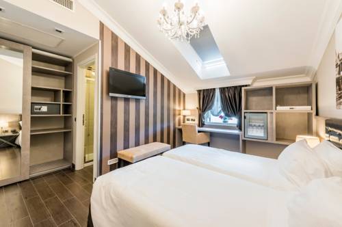 Imagen de la habitación del Hotel Il Corazziere. Foto 7