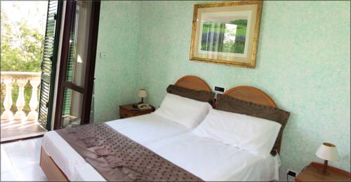 Imagen de la habitación del Hotel Il Corbezzolo. Foto 13