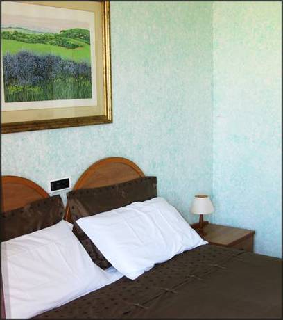 Imagen de la habitación del Hotel Il Corbezzolo. Foto 14