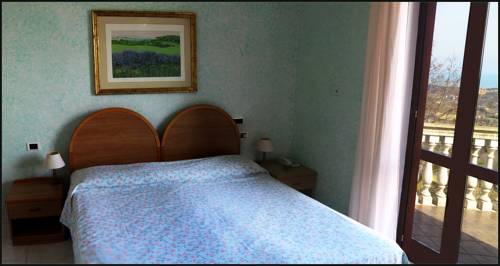 Imagen de la habitación del Hotel Il Corbezzolo. Foto 16