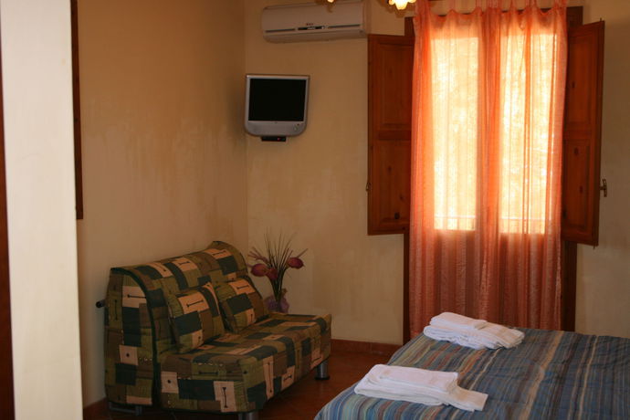 Imagen de la habitación del Hotel Il Cortile. Foto 3