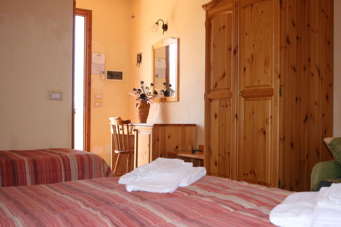 Imagen de la habitación del Hotel Il Cortile. Foto 7