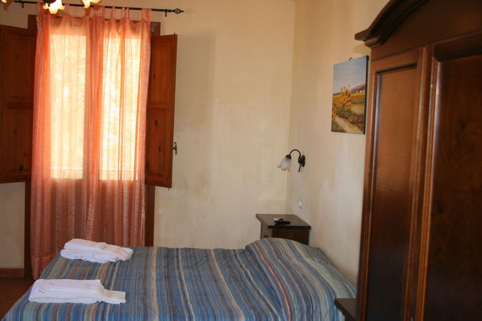 Imagen de la habitación del Hotel Il Cortile. Foto 10